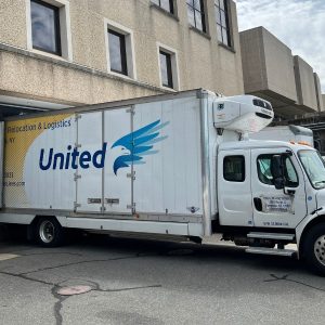 moving truck parked at a loading dock